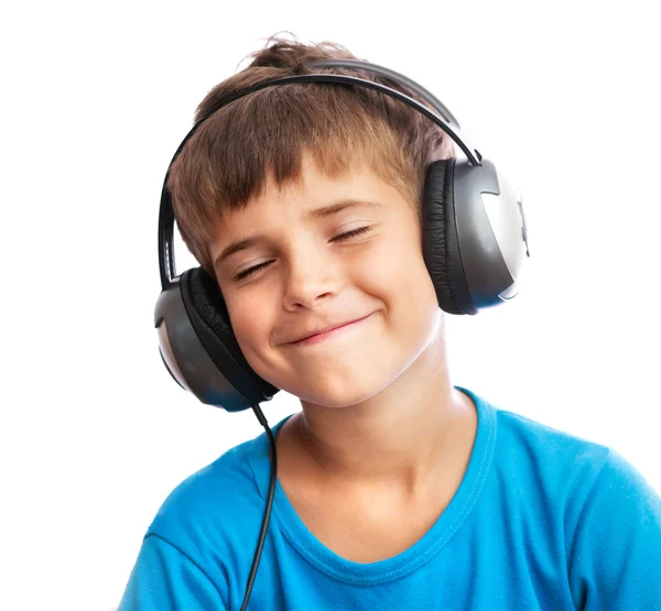 The boy is enjoy the music Royalty Free Stock Photos