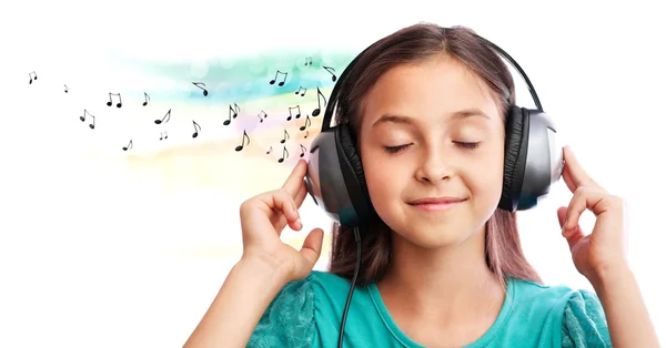 Het meisje dat naar muziek luistert — Stockfoto