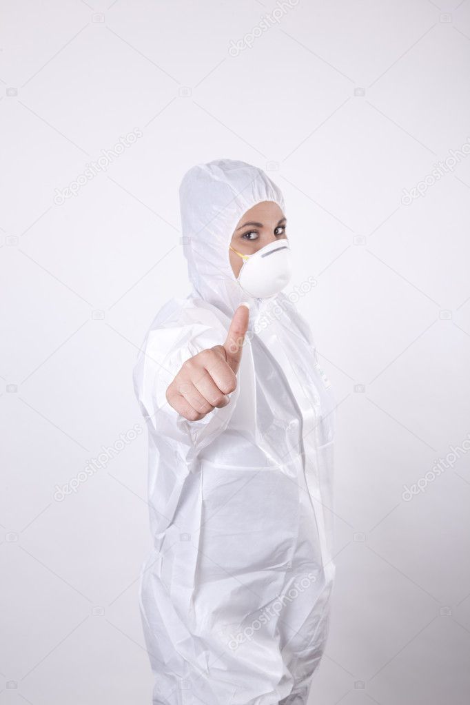 Young lab technician showing thumb up