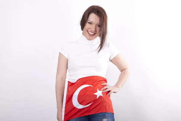 Young attractive girl holding flag of Turkey — Stock Photo, Image