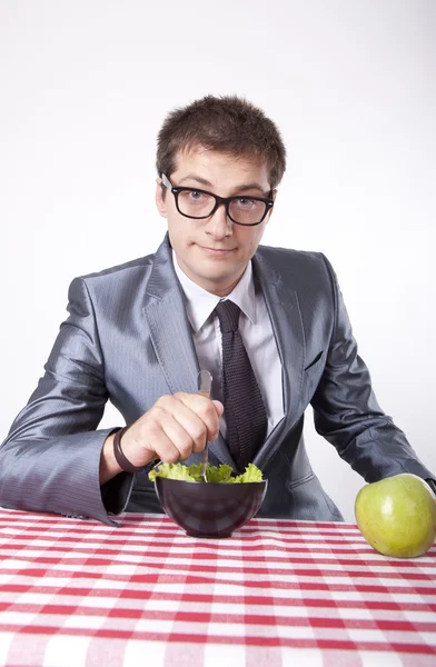 Young man eating — Stock Photo, Image