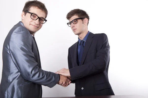 stock image Two young men shaking hands