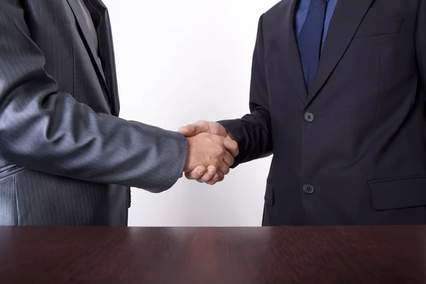 stock image Two young men shaking hands