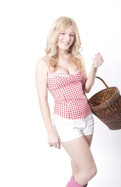 Young attractive woman with basket — Stock Photo, Image