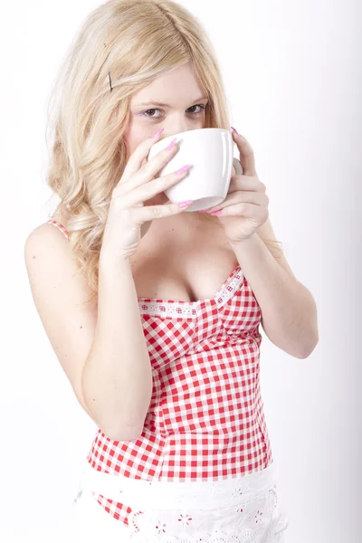 Young attractive woman drinking coffee — Stock Photo, Image
