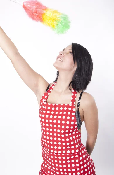 Young attractive woman with duster — Stock Photo, Image