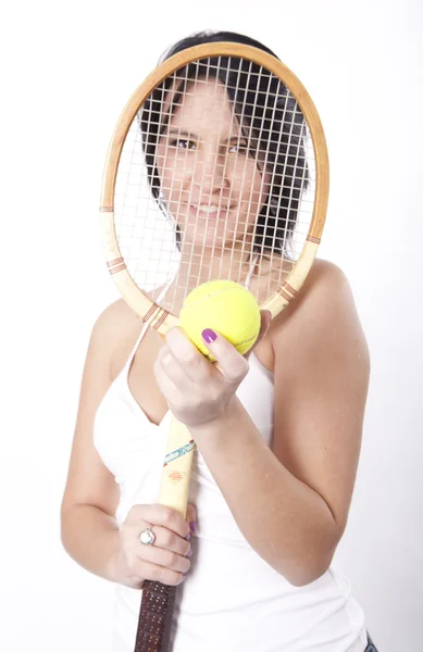 Jovem mulher atraente segurando raquete — Fotografia de Stock