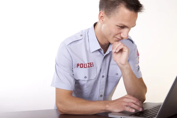 stock image Young attractive male policeman