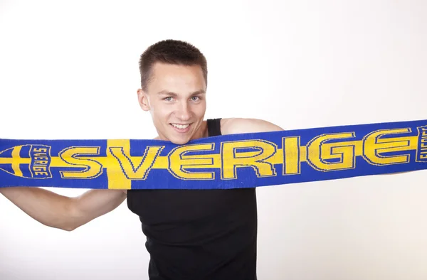 Genç güzel erkek İsveç fan — Stok fotoğraf