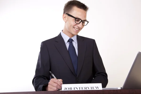 Jonge aantrekkelijke mannelijke secretaris Stockfoto