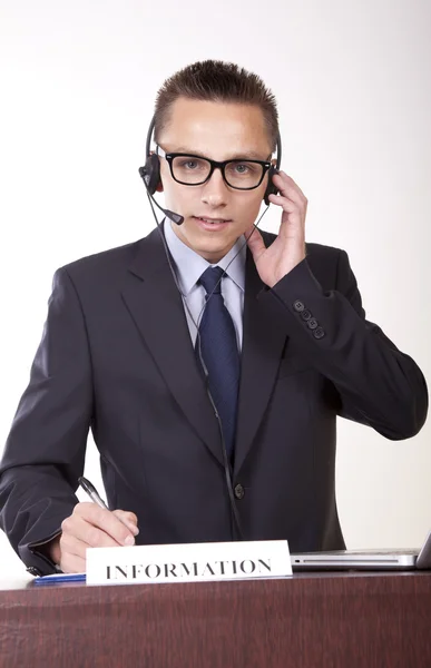 Young attractive male receptionist Stock Image