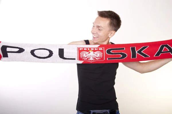 Junge schöne männliche Poland-Fan Stockfoto