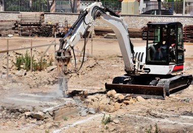 Excavator with hammer clipart