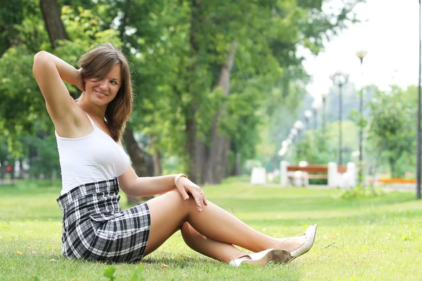 Woman in a park — Stock Photo, Image
