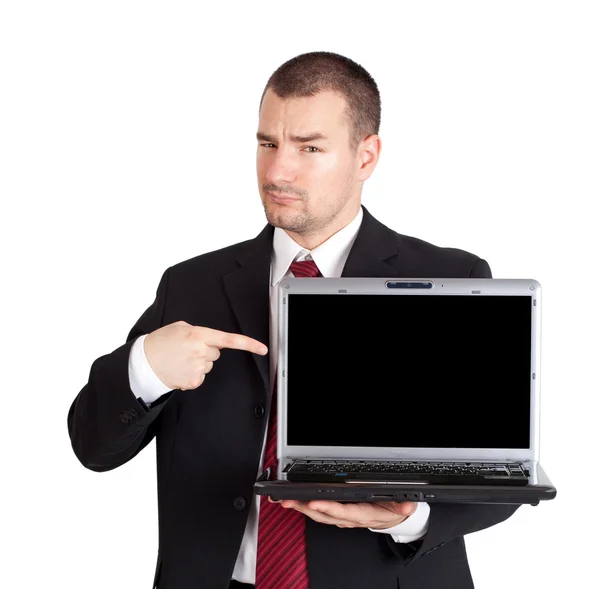 Homem de negócios apontando no laptop — Fotografia de Stock