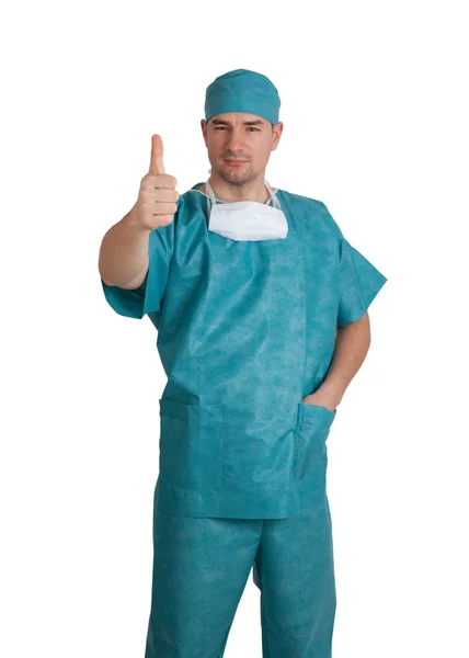 Doctor in scrubs thumb up — Stok fotoğraf