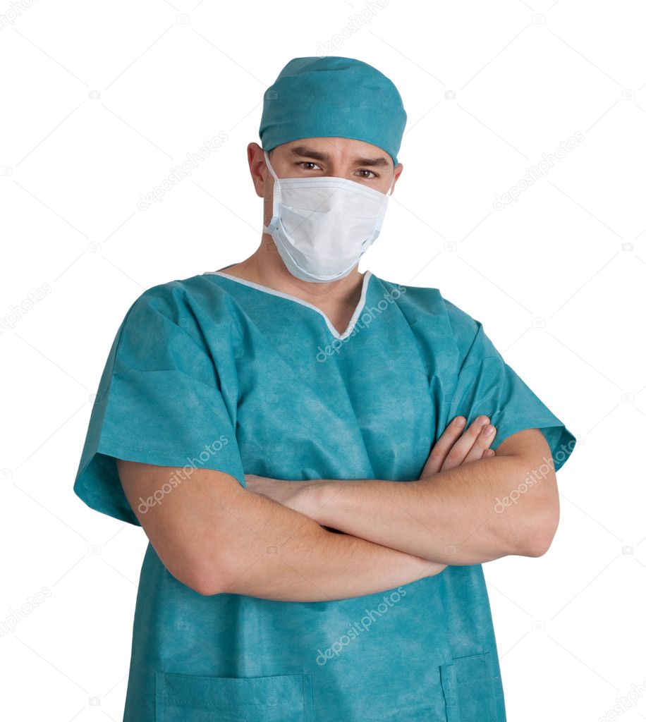 Doctor in scrubs with hands folded.
