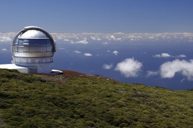 Astronomical observatory at the top of the island clipart