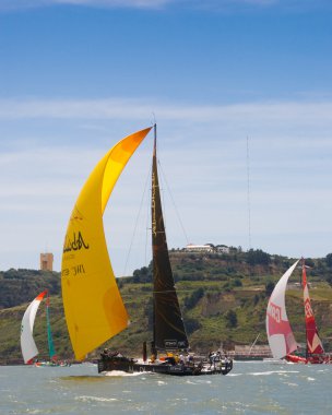 LISBON, PORTUGAL - JUNE 9: Abu Dhabi Ocean Racing Volvo Ocean Race - Lisbon StopOver - Harbour Race June 9, 2012 in Lisbon, Portugal clipart