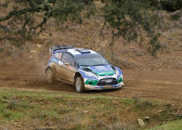 ALGARVE, PORTUGAL - MARÇO 31: Petter Solberg (NOR) conduz Ford Fiest RS WRC em Rally de Portugal 2012 em 31 de Março de 2012 no Algarve, Portugal — Fotografia de Stock
