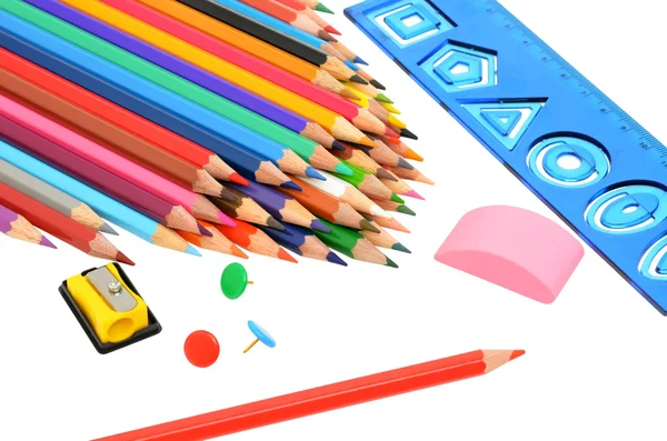 Lápices, reglas y sacapuntas de muchos colores —  Fotos de Stock