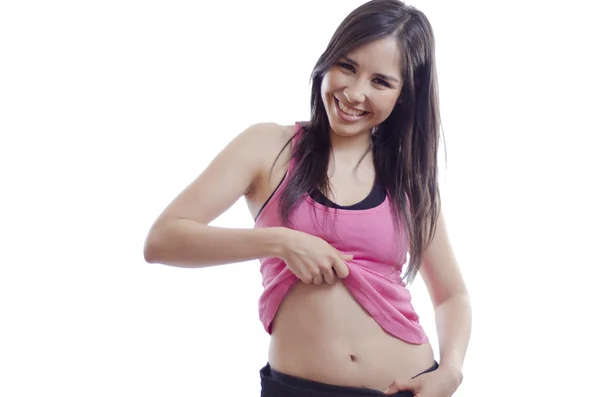 Cute girl showing her belly — Stock Photo, Image