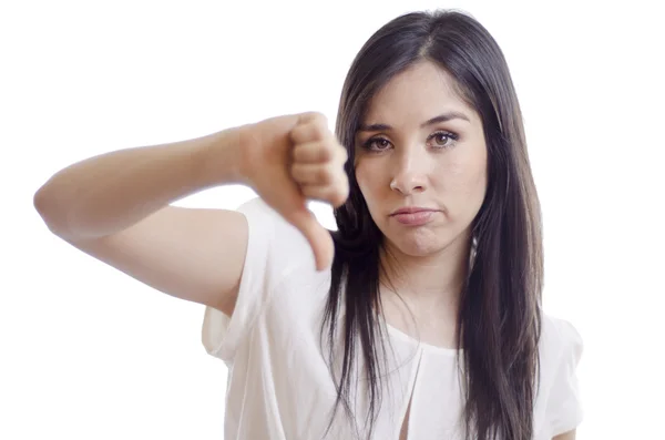 Disappointed young woman giving thumbs down — Stock Photo, Image