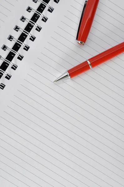 Red pen and notepad — Stock Photo, Image