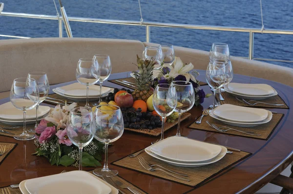 Dinner table on the yacht Royalty Free Stock Photos