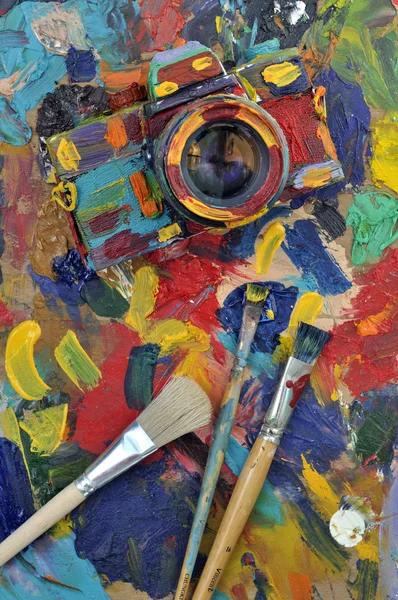 Colorful painted slr camera Royalty Free Stock Photos