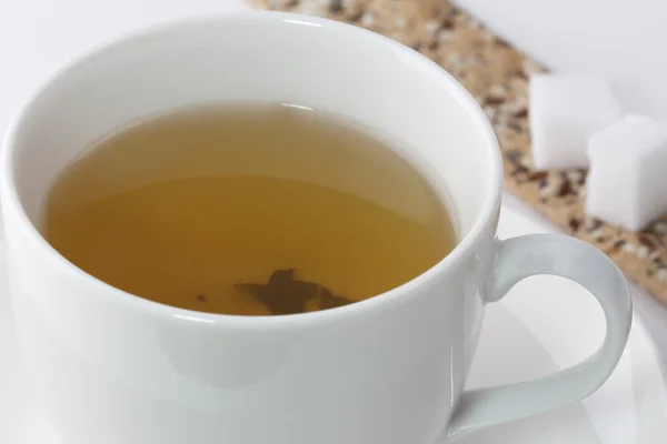 Tetera con té de jazmín y coockies — Foto de Stock