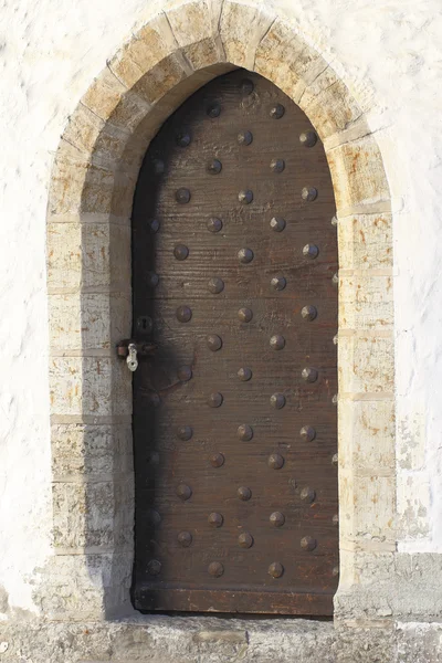 stock image Wooden door of old castle