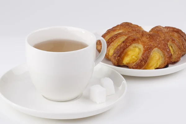 Tea and cake with banana and mango jam — Stock Photo, Image