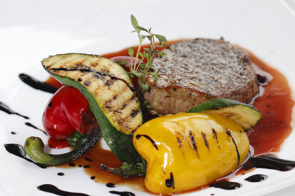 Roasted piece of meat with vegetables