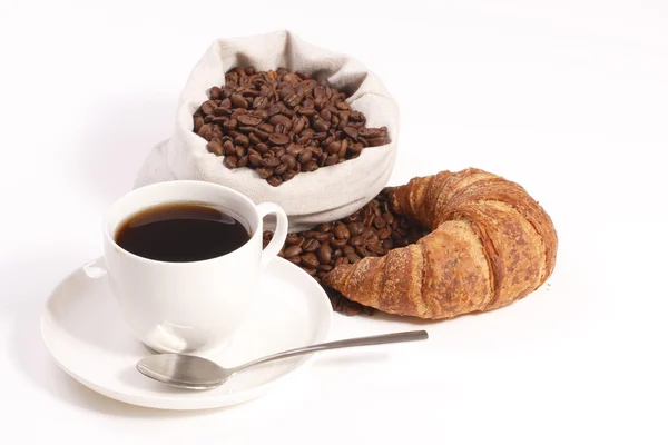 Cup of hot coffee with croissants — Stock Photo, Image