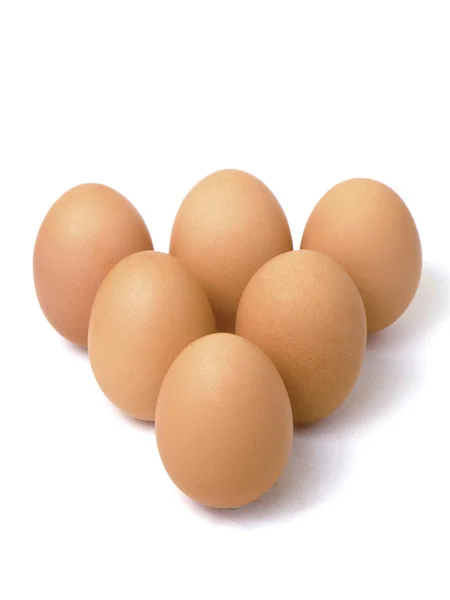 Six eggs in triangle shape — Stock Photo, Image