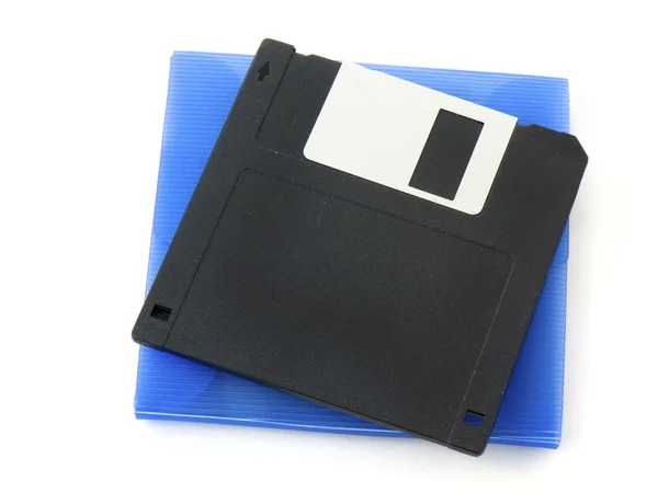 Disco floppy su un caso blu — Foto Stock