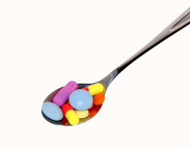 Spoon with tablets clipart