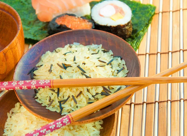 stock image Rice in multi-colored plates