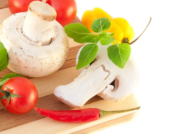 Mushrooms, pepper, tomatoes and a basil — Stock Photo, Image