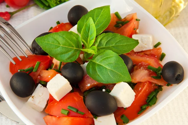 stock image Salad from tomatoes, olives and the cow cheese