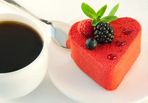 Stock image Cake in the form of heart with a blackberry