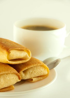 Fritters with a cup of coffee