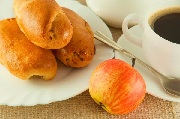 stock image Fresh pies and cup of fragrant coffee on a white background