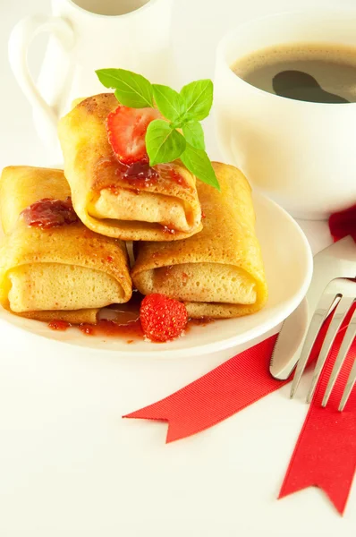 Stock image Fritters with red ribbon and mint and a cup of coffee