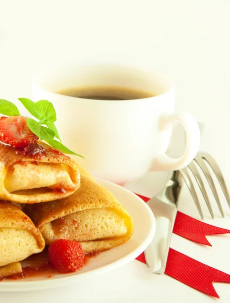 stock image Fritters with red ribbon and mint and a cup of coffee