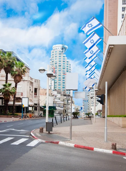 stock image The street in Tel Aviv, national flags of Israel