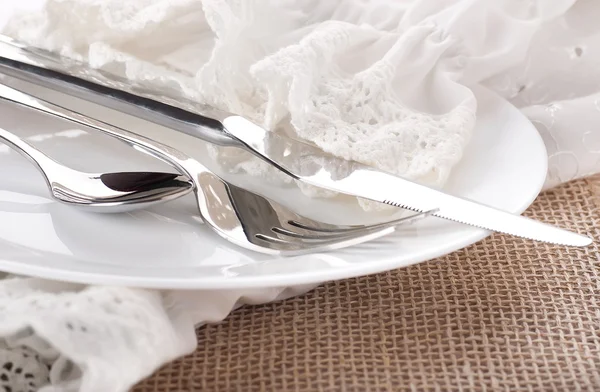 Table fork and knife in a napkin of medieval style — Stock Photo, Image