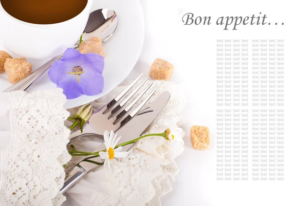 Table fork and knife in a napkin of medieval style, flower — Stock Photo, Image