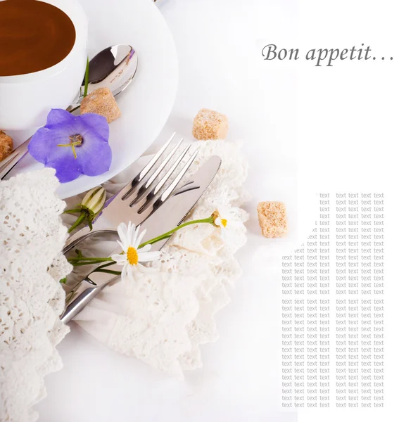 Table fork and knife in a napkin of medieval style, flower — Stock Photo, Image